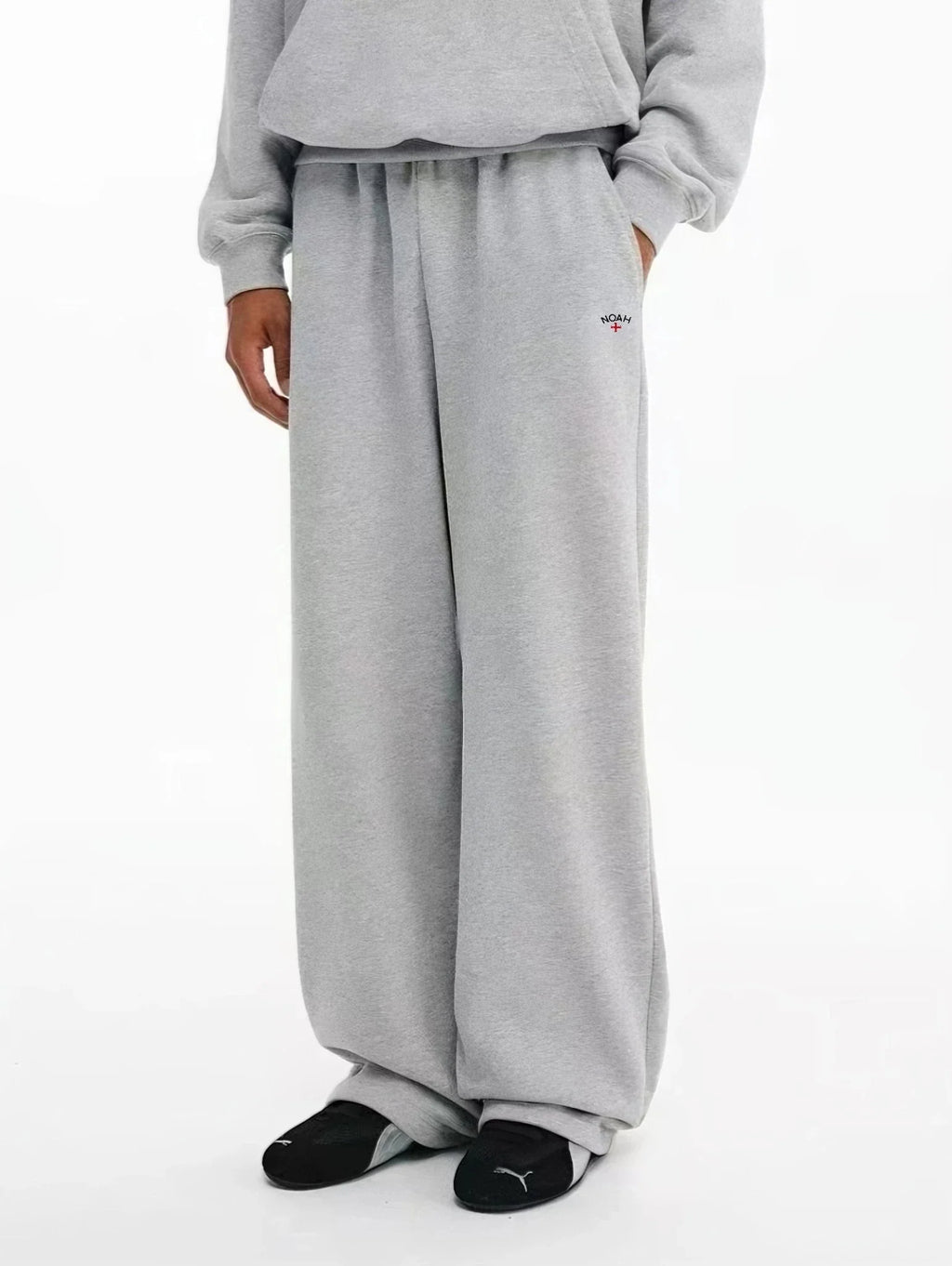 NOAH MARS Cross Logo Embroidered Micro Flared Sweatpants Men Casual Sports Pants